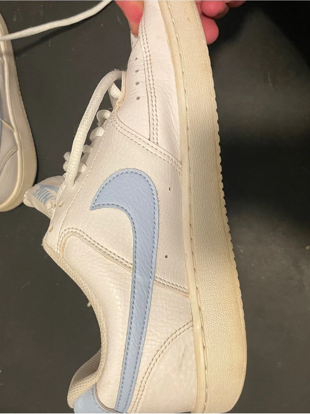 Nike White Low-Top Sneakers with Light Blue Swoosh